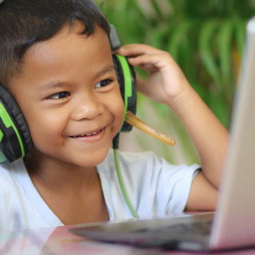 asian-boy-kid-sitting-table-with-laptop-preparing-school-online-education-concept-online-video-call-conference-class-lesson-study
